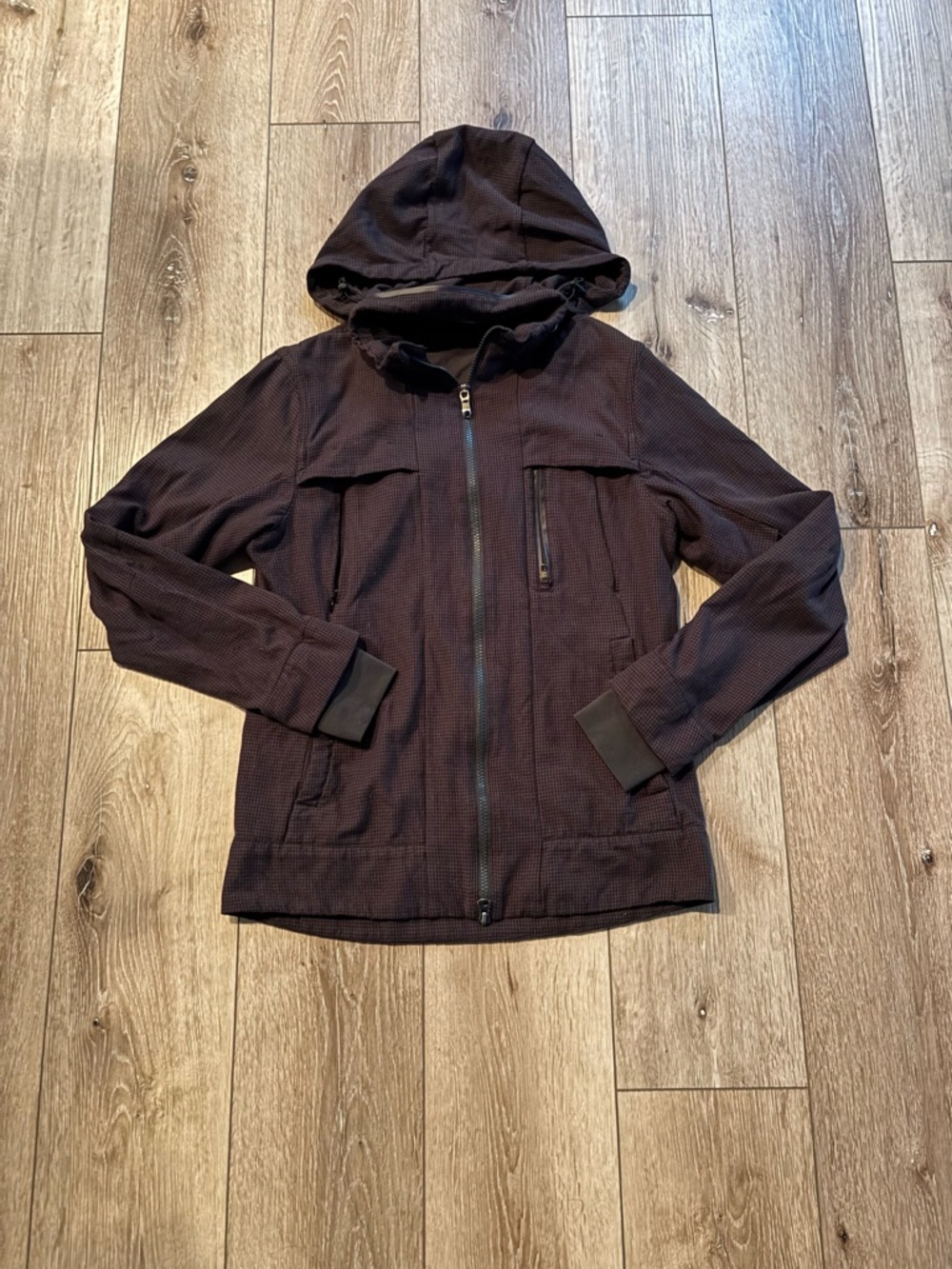 Mens Lululemon Relay Jacket in a brown/black houndstooth pattern